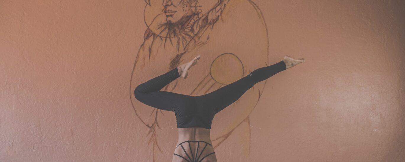 Woman yoga standing on head